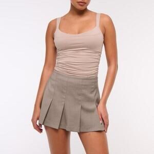 Brown pleated mini skirt